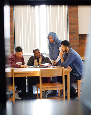 a froup of student studying in the library
