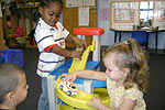Children playing with cars