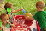 Children at a water table