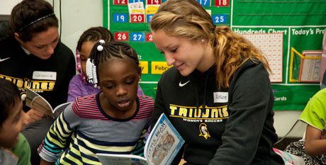 MCC student reading to a child
