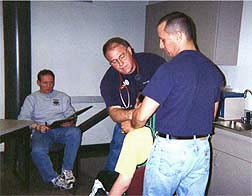 photo of faculty and student doing basic assessment