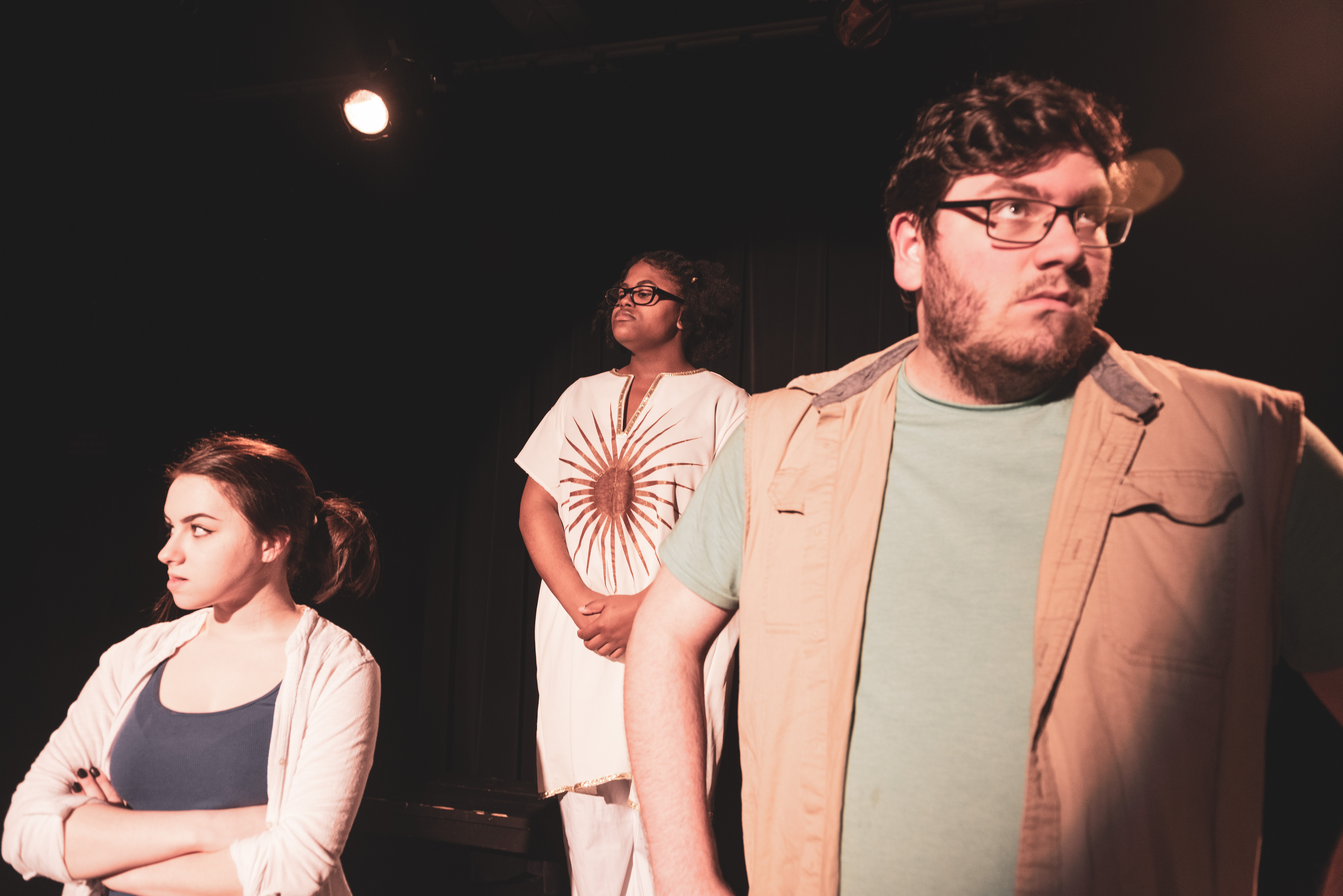 Close up of three theater students