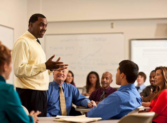 Students sit in a lecture class