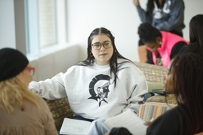 a student listening to another student