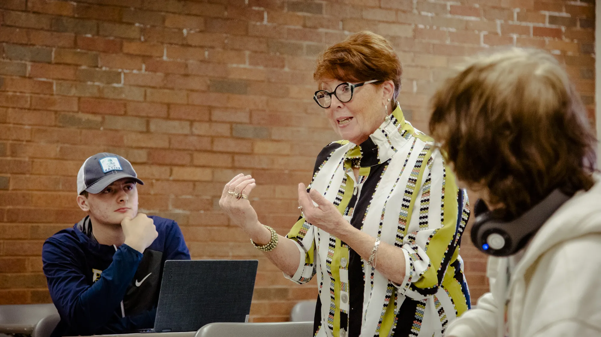 A professor speaking to students
