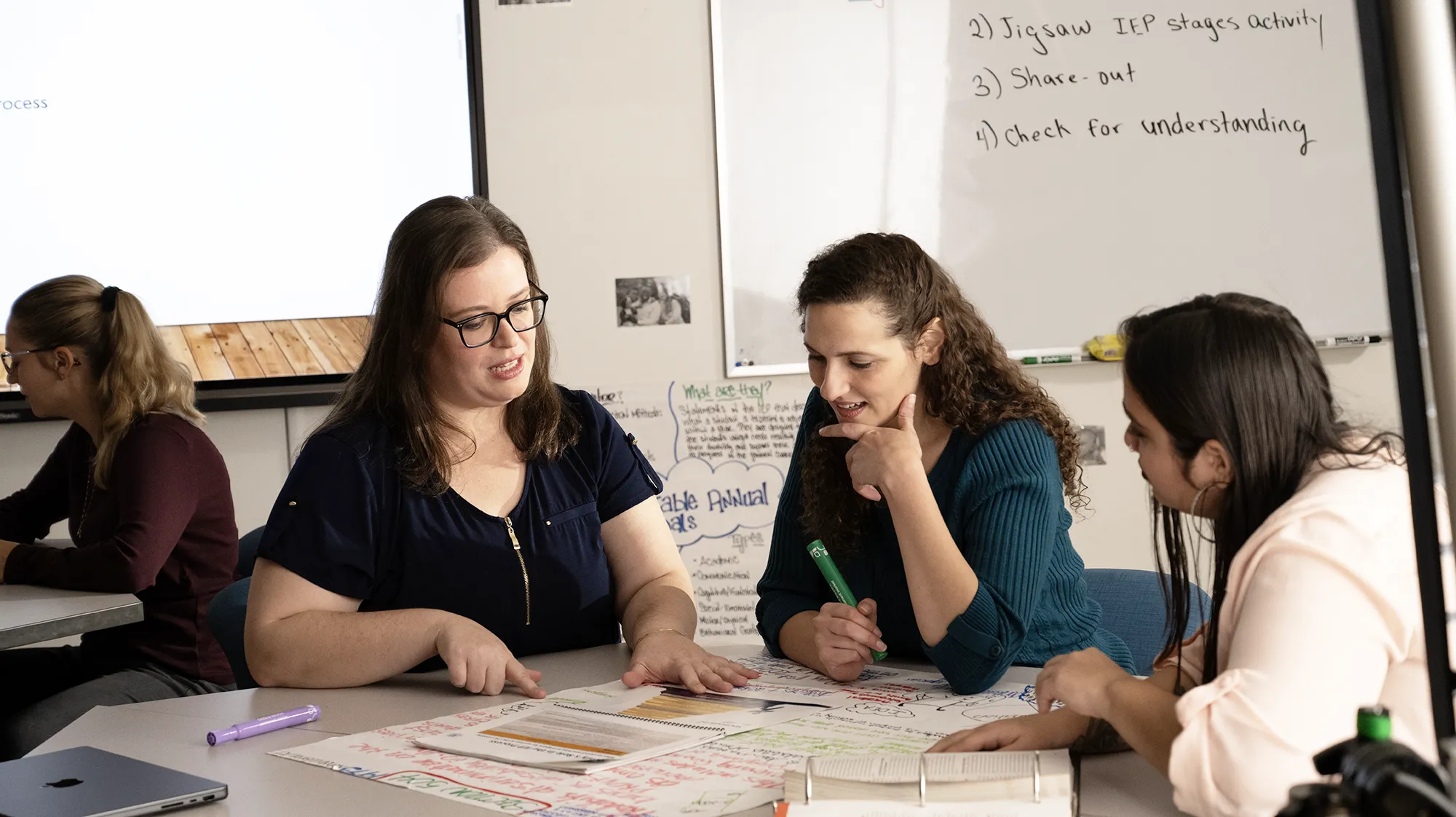 a teacher helping a student