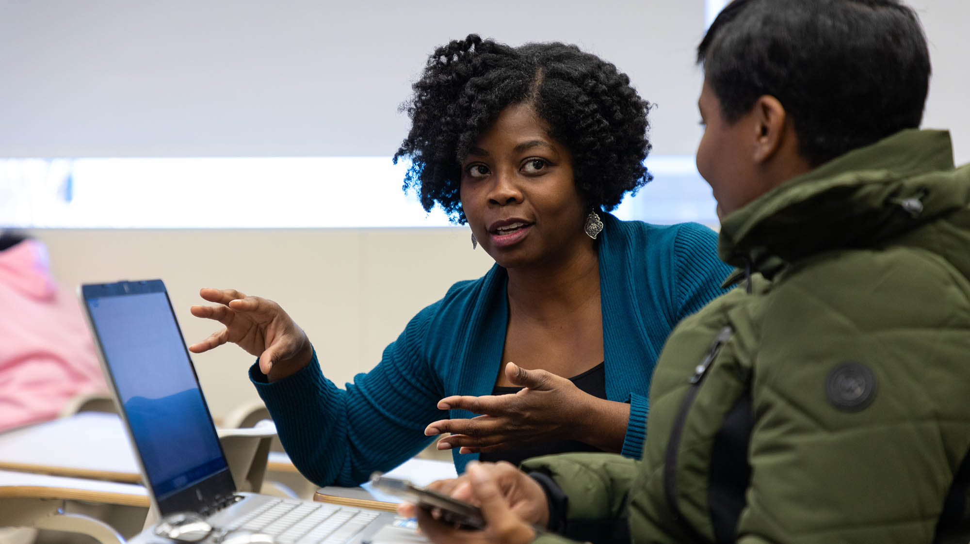 MCC Student (left) meeting with Student Success Coach (right)