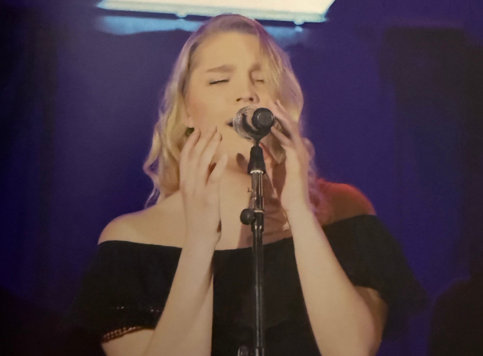 a student singing
