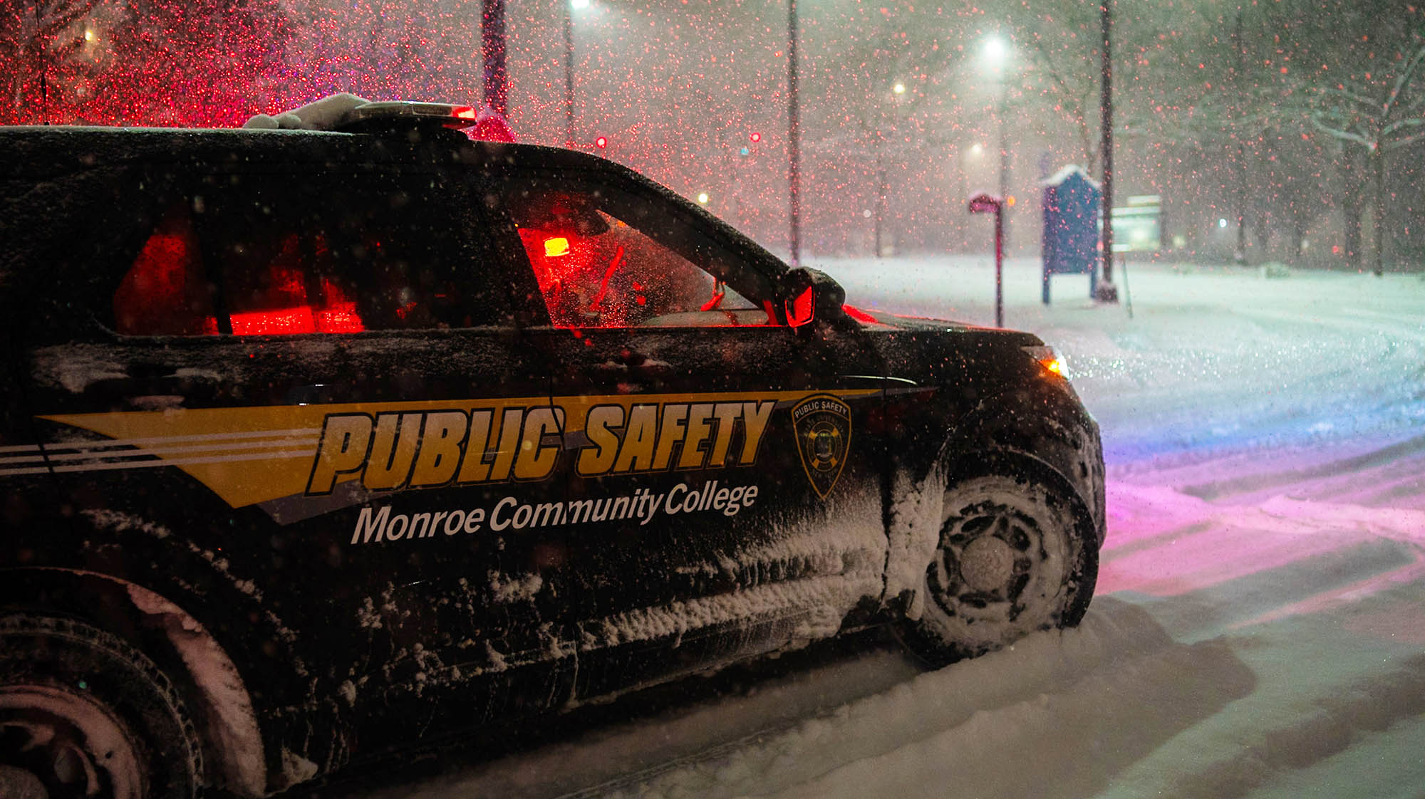 a public safety SUV surrounded by snow