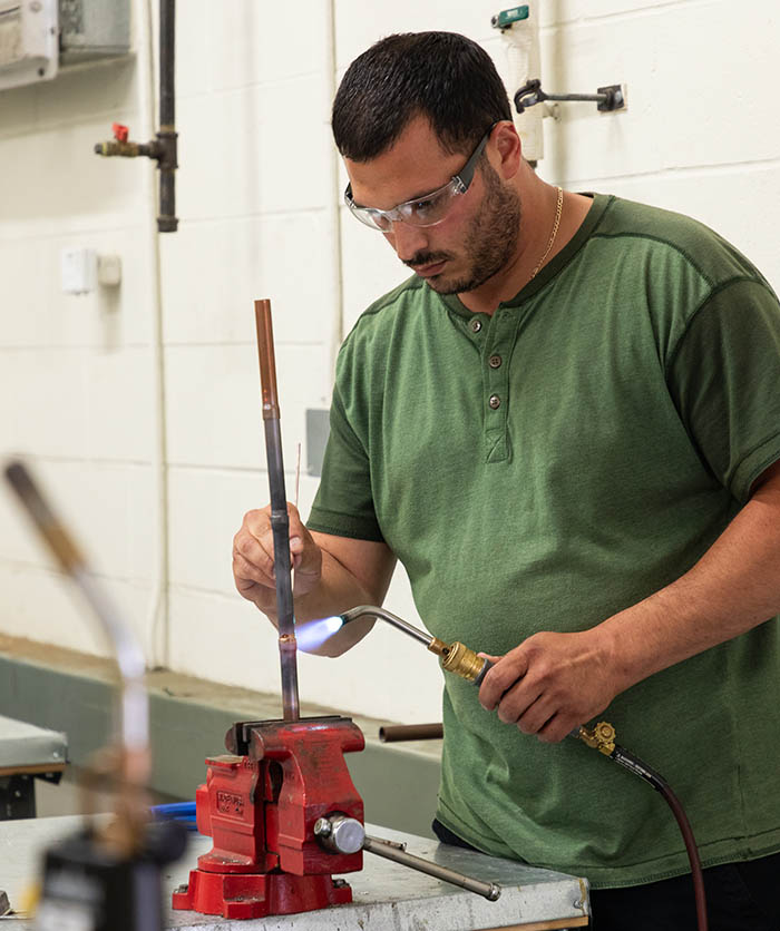 a student welding