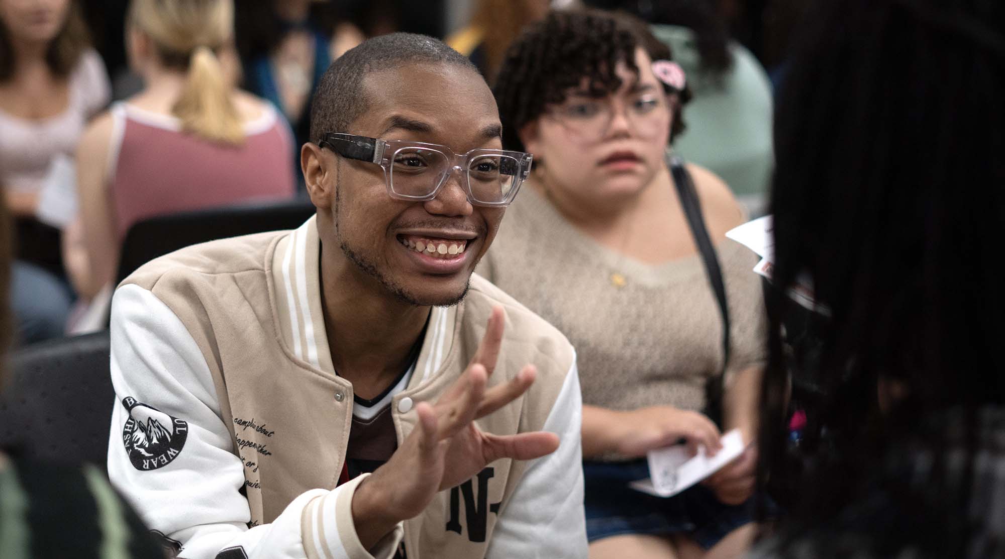 a student smiling