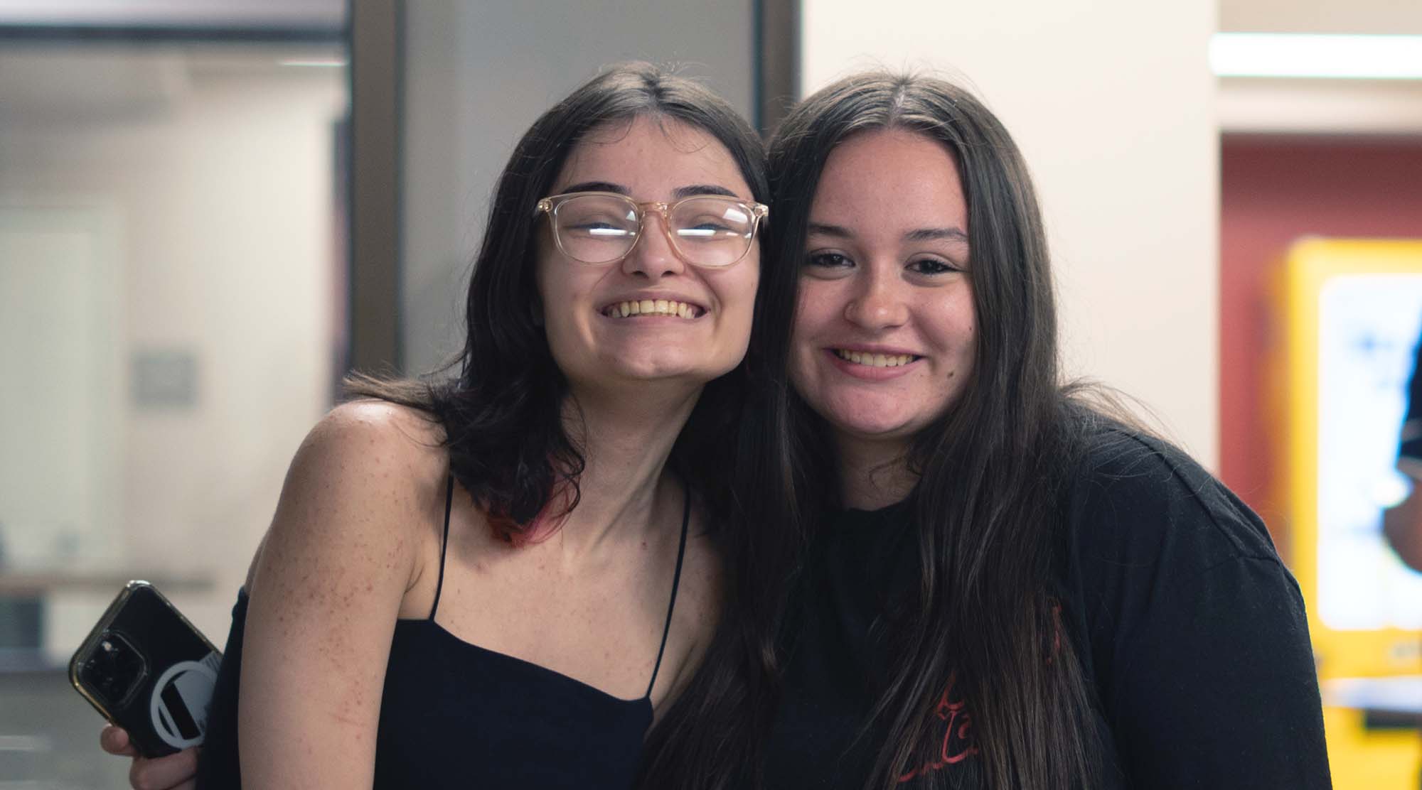 2 students smiling