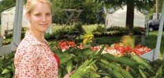 Woman at vegetable stand