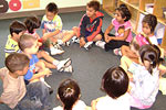 Children in circle in classroom