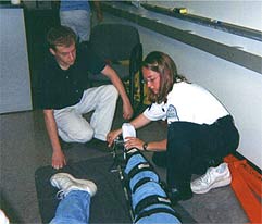 Photo of paramedics demonstrating traction