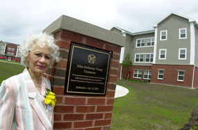 Dr. Alice Holloway Young in front of the residence halls