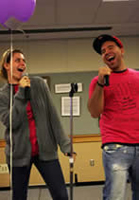 Photo of student singing karaoke