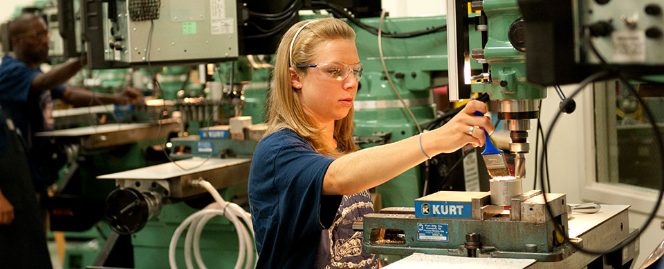 Student at tooling machine