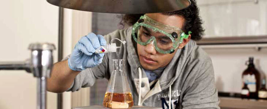 Photo of student in a lab