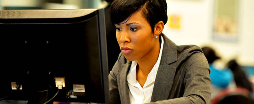 Photo of student in the computer lab