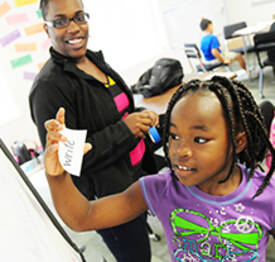 Student and teacher at Healthy Hero summer camp