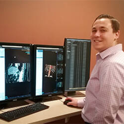 MCC radiologic tech graduate at work at the University of Rochester