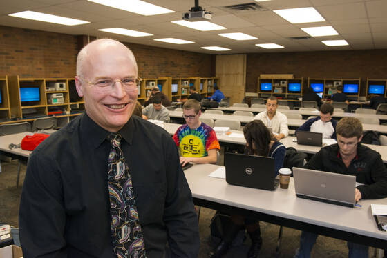 John Wadach working in lab
