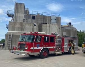 Fire engine truck in front of building