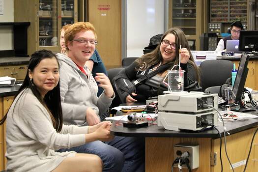 Students at a computer workstation in the Physics Labs