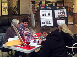 Student volunteers registering peers to vote