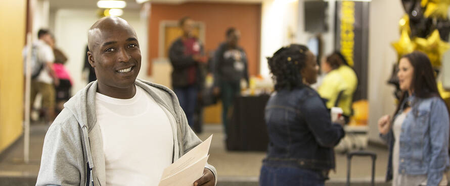 a male student at the Downtown Campus