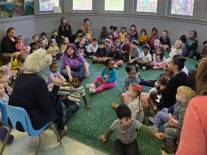 group of children being read to