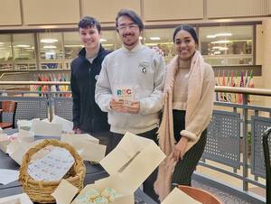 Students selling ROC the Day Cupcakes