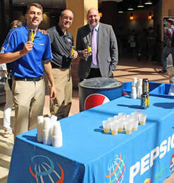 Pepsi representative handing out samples