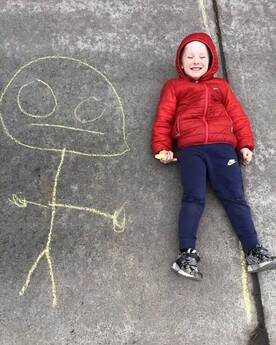Child playing with chalk