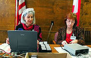 paralegal and judge reviewing evidence