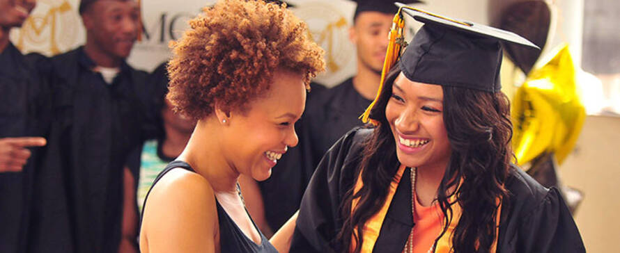 Student and her sister after Commencement