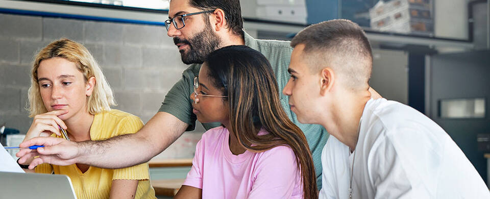 An instructor teaching students