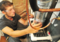 MCC HVAC student working on equipment